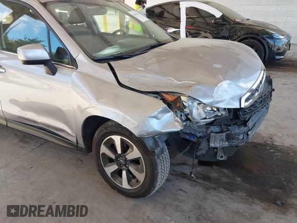 2017 Subaru Forester Limited with VIN JF2SJAJC9HH541129, listed as a IAAI auction lot 43401928 with 91,345 mi miles and . Bid and sale history available at DreamBid. Image 6.