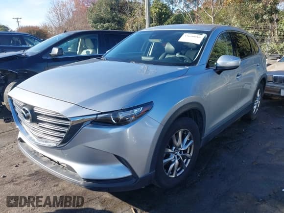 ✅ 2017 Mazda CX-9 Touring • VIN: JM3TCBCY5H0137990 • Lot: 43690016. Listed on IAAI with 62,668 mi. Free auction sales archive from the USA and detailed vehicle history report at DreamBid. Image 2.