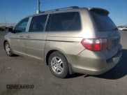 ✅ 2005 Honda Odyssey EX-L • VIN: 5FNRL38705B097212 • Лот: 92655085. Опубликован ранее на Copart с пробегом 162 776 миль. Бесплатный доступ к архиву аукционных продаж из США и подробный отчёт об истории автомобиля на DreamBid. Изображение 2.