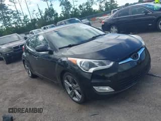 ✅ 2015 Hyundai Veloster • VIN: KMHTC6AD9FU235289 • Lot: 42244334. Wystawiony na IAAI z przebiegiem 117 082 mil. Bezpłatny archiwum sprzedaży aukcyjnych z USA i szczegółowy raport historii pojazdu na DreamBid. Zdjęcie 1.
