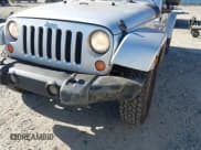 ✅ 2007 Jeep Wrangler Unlimited Sahara • VIN: 1J4GB59167L152708 • Lot: 43722971. Listed on IAAI with 215,920 mi. Free auction sales archive from the USA and detailed vehicle history report at DreamBid. Image 6.