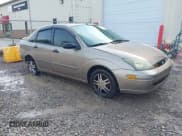 ✅ 2004 Ford Focus SE • VIN: 1FAFP343X4W156745 • Lot: 42501461. Listed on IAAI with 289,925 mi. Free auction sales archive from the USA and detailed vehicle history report at DreamBid. Image 1.