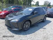 ✅ 2023 Lexus RZ 450e Premium • VIN: JTJAAAAB8PA008582 • Lot: 42574842. Listed on IAAI with 27,428 mi. Free auction sales archive from the USA and detailed vehicle history report at DreamBid. Image 2.