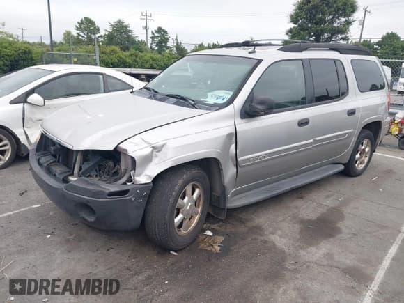 ✅ 2004 GMC Envoy SLE • VIN: 1GKES16S746136499 • Lot: 43016716. Listed on IAAI with 306,631 mi. Free auction sales archive from the USA and detailed vehicle history report at DreamBid. Image 17.