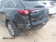 ✅ 2018 Mazda CX-9 Grand Touring • VIN: JM3TCADY9J0229571 • Lot: 43011548. Listed on IAAI with 147,896 mi. Free auction sales archive from the USA and detailed vehicle history report at DreamBid. Image 6.