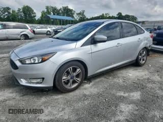 ✅ 2018 Ford Focus SE • VIN: 1FADP3F29JL226552 • Lot: 63301605. Listed on Copart with 143,137 mi. Free auction sales archive from the USA and detailed vehicle history report at DreamBid. Image 1.