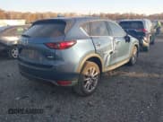 ✅ 2019 Mazda CX-5 Grand Touring Reserve • VIN: JM3KFBDYXK0568219 • Lot: 43619359. Listed on IAAI with 65,252 mi. Free auction sales archive from the USA and detailed vehicle history report at DreamBid. Image 4.