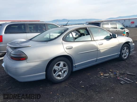 ✅ 2000 Pontiac Grand Prix GT • VIN: 1G2WP52K0YF327156 • Lot: 43697562. Listed on IAAI with 190,969 mi. Free auction sales archive from the USA and detailed vehicle history report at DreamBid. Image 4.