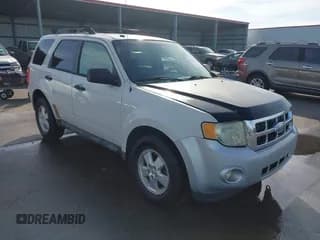 ✅ 2012 Ford Escape XLT • VIN: 1FMCU9DG9CKA24136 • Lot: 43767035. Listed on IAAI with 222,469 mi. Free auction sales archive from the USA and detailed vehicle history report at DreamBid. Image 1.