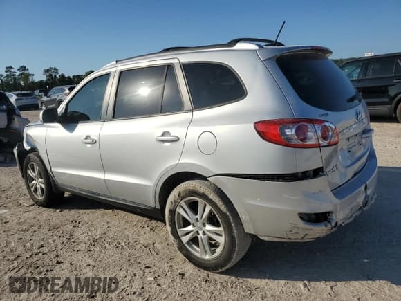 ✅ 2012 Hyundai Santa Fe SE • VIN: 5XYZH4AG5CG097214 • Lot: 80681584. Listed on Copart with 55,806 mi. Free auction sales archive from the USA and detailed vehicle history report at DreamBid. Image 2.