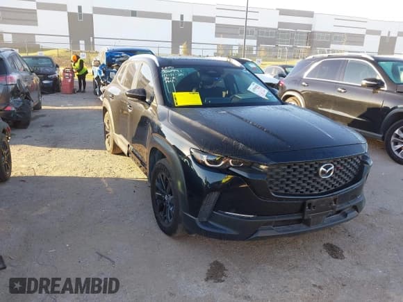 ✅ 2025 Mazda CX-50 S Premium • VIN: 7MMVABDM2SN308563 • Lot: 43559518. Listed on IAAI with 10,045 mi. Free auction sales archive from the USA and detailed vehicle history report at DreamBid. Image 1.