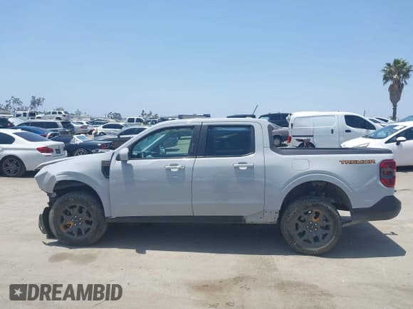 ✅ 2023 Ford Maverick Lariat Advanced • VIN: 3FTTW8G94PRA03461 • Лот: 42565827. Опубликован ранее на IAAI с пробегом 27 400 миль. Бесплатный доступ к архиву аукционных продаж из США и подробный отчёт об истории автомобиля на DreamBid. Изображение 14.