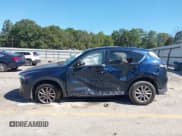 ✅ 2023 Mazda CX-5 S Carbon Edition • VIN: JM3KFBCM0P0146286 • Лот: 43365642. Опубликован ранее на IAAI с пробегом 75 498 миль. Бесплатный доступ к архиву аукционных продаж из США и подробный отчёт об истории автомобиля на DreamBid. Изображение 13.