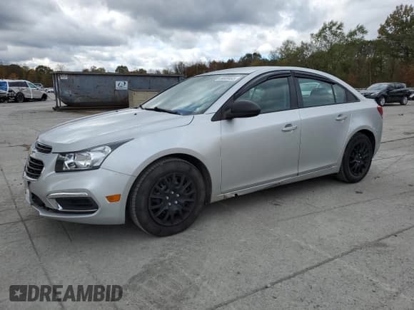 ✅ 2015 Chevrolet Cruze LS • VIN: 1G1PA5SG0F7169429 • Lot: 89809465. Listed on Copart with 114,787 mi. Free auction sales archive from the USA and detailed vehicle history report at DreamBid. Image 1.