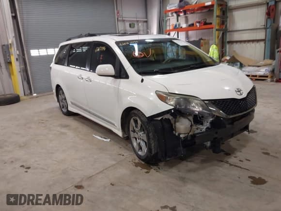 ✅ 2014 Toyota Sienna SE • VIN: 5TDXK3DC7ES497390 • Lot: 42037096. Listed on IAAI with 169,127 mi. Free auction sales archive from the USA and detailed vehicle history report at DreamBid. Image 1.