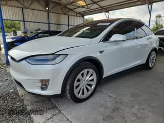 ✅ 2020 Tesla Model X Long Range • VIN: 5YJXCDE26LF303233 • Lot: 70808465. Wystawiony na Copart z przebiegiem 65 522 mil. Bezpłatny archiwum sprzedaży aukcyjnych z USA i szczegółowy raport historii pojazdu na DreamBid. Zdjęcie 1.