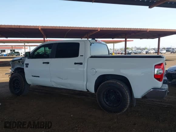 ✅ 2020 Toyota Tundra SR5 • VIN: 5TFEY5F12LX261766 • Lot: 43022777. Listed on IAAI with 46,549 mi. Free auction sales archive from the USA and detailed vehicle history report at DreamBid. Image 14.