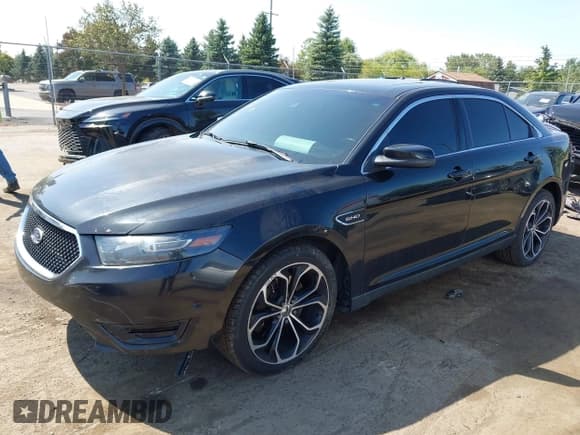 ✅ 2013 Ford Taurus SHO • VIN: 1FAHP2KT5DG116265 • Lot: 43182852. Listed on IAAI with 157,673 mi. Free auction sales archive from the USA and detailed vehicle history report at DreamBid. Image 2.