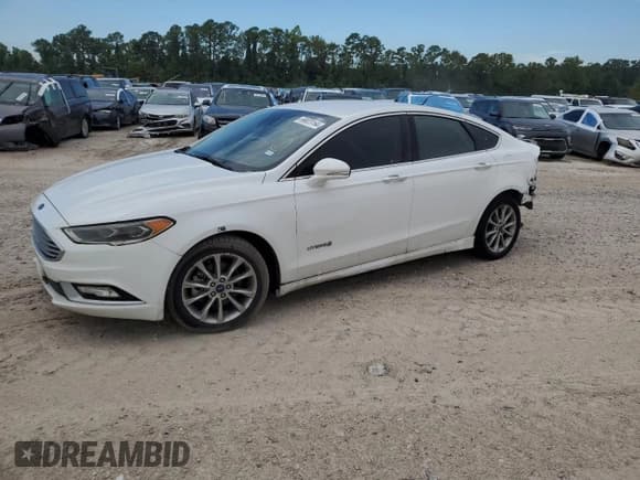 ✅ 2017 Ford Fusion Hybrid SE • VIN: 3FA6P0LU5HR409391 • Lot: 69023164. Listed on Copart with 122,575 mi. Free auction sales archive from the USA and detailed vehicle history report at DreamBid. Image 1.