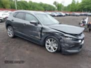 ✅ 2023 Mazda CX-30 S Premium • VIN: 3MVDMBDM9PM570034 • Lot: 42472588. Listed on IAAI with 30,715 mi. Free auction sales archive from the USA and detailed vehicle history report at DreamBid. Image 1.