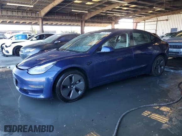 ✅ 2022 Tesla Model 3 • VIN: 5YJ3E1EA2NF369439 • Lot: 90941605. Listed on Copart with 150,796 mi. Free auction sales archive from the USA and detailed vehicle history report at DreamBid. Image 1.