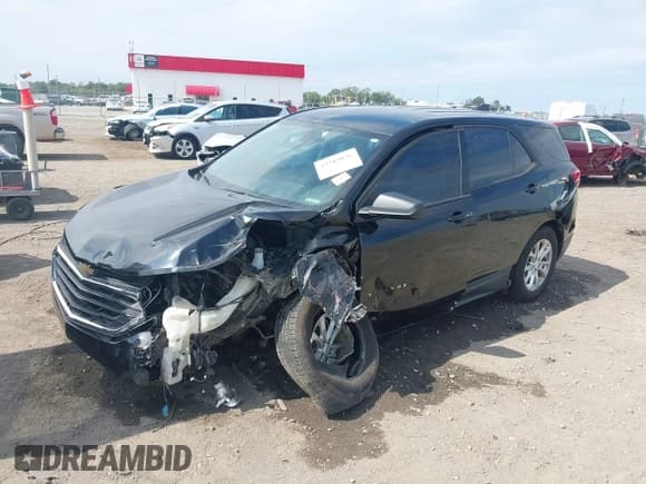 ✅ 2019 Chevrolet Equinox LS • VIN: 2GNAXHEV5K6295780 • Лот: 43389876. Опубликован ранее на IAAI с пробегом 98 949 миль. Бесплатный доступ к архиву аукционных продаж из США и подробный отчёт об истории автомобиля на DreamBid. Изображение 2.