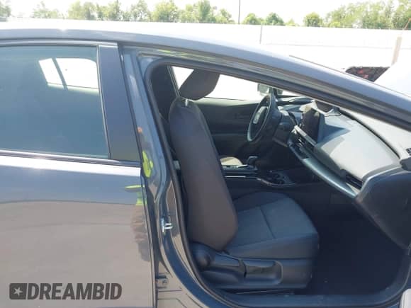 2024 Toyota Prius LE with VIN JTDACAAUXR3032131, listed as a IAAI auction lot 43231631 with 15,535 mi miles and . Bid and sale history available at DreamBid. Image 5.