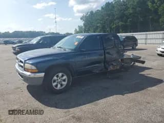 ✅ 2004 Dodge Dakota SLT • VIN: 1D7HL48N34S663905 • Lot: 65787065. Wystawiony na Copart z przebiegiem Nie podano. Bezpłatny archiwum sprzedaży aukcyjnych z USA i szczegółowy raport historii pojazdu na DreamBid. Zdjęcie 1.