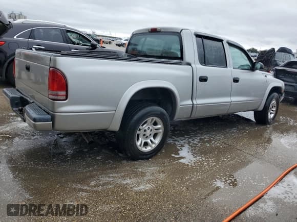 ✅ 2002 Dodge Dakota Sport • VIN: 1B7HL38X12S545810 • Lot: 80880884. Wystawiony na Copart z przebiegiem 161 245 mil. Bezpłatny archiwum sprzedaży aukcyjnych z USA i szczegółowy raport historii pojazdu na DreamBid. Zdjęcie 3.