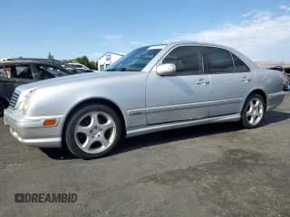 ✅ 2001 Mercedes-Benz E 320 • VIN: WDBJF70J21B244077 • Лот: 81507975. Опубликован ранее на Copart с пробегом 153 632 миль. Бесплатный доступ к архиву аукционных продаж из США и подробный отчёт об истории автомобиля на DreamBid. Изображение 1.