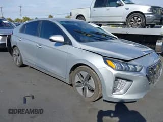 ✅ 2021 Hyundai Ioniq SEL • VIN: KMHC85LC8MU261296 • Лот: 43514599. Опубликован ранее на IAAI с пробегом 106 941 миль. Бесплатный доступ к архиву аукционных продаж из США и подробный отчёт об истории автомобиля на DreamBid. Изображение 1.