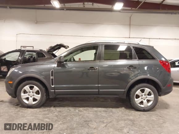 ✅ 2013 Chevrolet Captiva Sport LS • VIN: 3GNFL2EK7DS516739 • Lot: 42216391. Wystawiony na IAAI z przebiegiem 69 638 mil. Bezpłatny archiwum sprzedaży aukcyjnych z USA i szczegółowy raport historii pojazdu na DreamBid. Zdjęcie 14.