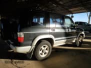 ✅ 2000 Isuzu Trooper S • VIN: JACDJ58X2Y7J03502 • Lot: 41897665. Listed on Copart with 183,081 mi. Free auction sales archive from the USA and detailed vehicle history report at DreamBid. Image 3.