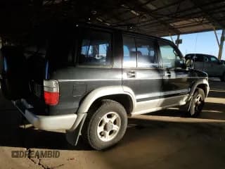 ✅ 2000 Isuzu Trooper S • VIN: JACDJ58X2Y7J03502 • Lot: 41897665. Listed on Copart with 183,081 mi. Free auction sales archive from the USA and detailed vehicle history report at DreamBid. Image 3.