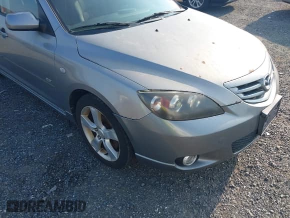 ✅ 2005 Mazda 3 s • VIN: JM1BK143951255390 • Lot: 42851705. Listed on IAAI with 209,770 mi. Free auction sales archive from the USA and detailed vehicle history report at DreamBid. Image 6.