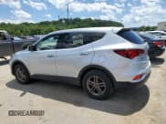 ✅ 2018 Hyundai Santa Fe 2.4L • VIN: 5XYZT3LB2JG565925 • Лот: 57539894. Опубликован ранее на Copart с пробегом 86 115 миль. Бесплатный доступ к архиву аукционных продаж из США и подробный отчёт об истории автомобиля на DreamBid. Изображение 2.