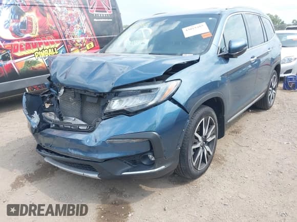 ✅ 2021 Honda Pilot Touring 8-Passenger • VIN: 5FNYF6H95MB000378 • Lot: 43015485. Listed on IAAI with 109,626 mi. Free auction sales archive from the USA and detailed vehicle history report at DreamBid. Image 18.