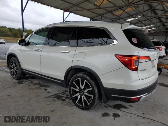 ✅ 2019 Honda Pilot Touring 8-Passenger • VIN: 5FNYF5H98KB033740 • Lot: 90401525. Listed on Copart with 91,251 mi. Free auction sales archive from the USA and detailed vehicle history report at DreamBid. Image 2.