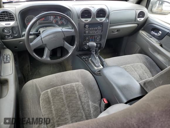 ✅ 2003 GMC Envoy SLT • VIN: 1GKET16S036137165 • Lot: 57718865. Wystawiony na Copart z przebiegiem 200 282 mil. Bezpłatny archiwum sprzedaży aukcyjnych z USA i szczegółowy raport historii pojazdu na DreamBid. Zdjęcie 8.