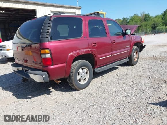 ✅ 2002 Chevrolet Tahoe LT • VIN: 1GNEC13Z62J274157 • Lot: 42055825. Listed on IAAI with 244,250 mi. Free auction sales archive from the USA and detailed vehicle history report at DreamBid. Image 4.