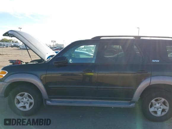 ✅ 2001 Toyota Sequoia SR5 • VIN: 5TDBT44A71S031741 • Lot: 43790394. Wystawiony na IAAI z przebiegiem 199 759 mil. Bezpłatny archiwum sprzedaży aukcyjnych z USA i szczegółowy raport historii pojazdu na DreamBid. Zdjęcie 6.