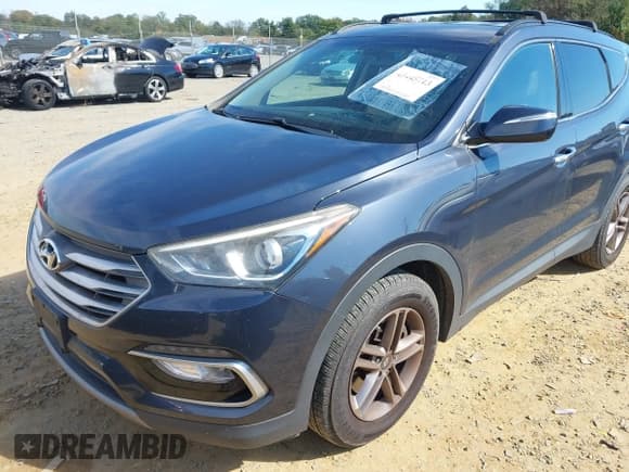 ✅ 2018 Hyundai Santa Fe 2.4L • VIN: 5NMZUDLBXJH059736 • Лот: 43445713. Опубликован ранее на IAAI с пробегом 138 393 миль. Бесплатный доступ к архиву аукционных продаж из США и подробный отчёт об истории автомобиля на DreamBid. Изображение 2.