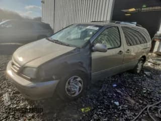 ✅ 2002 Toyota Sienna LE • VIN: 4T3ZF13C72U424503 • Lot: 94248025. Listed on Copart with 231,648 mi. Free auction sales archive from the USA and detailed vehicle history report at DreamBid. Image 1.