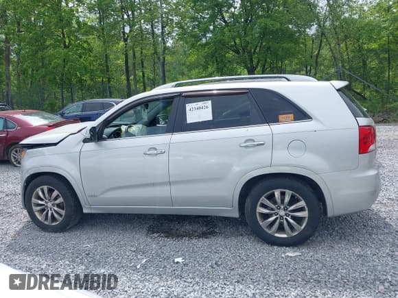 ✅ 2013 Kia Sorento SX • VIN: 5XYKWDA2XDG362271 • Lot: 42340426. Listed on IAAI with 94,459 mi. Free auction sales archive from the USA and detailed vehicle history report at DreamBid. Image 14.