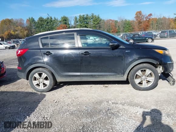 ✅ 2011 Kia Sportage LX • VIN: KNDPBCA20B7026330 • Lot: 43600734. Listed on IAAI with 192,891 mi. Free auction sales archive from the USA and detailed vehicle history report at DreamBid. Image 13.