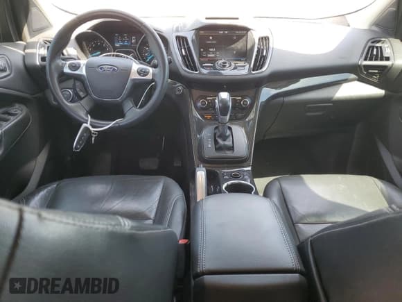 ✅ 2015 Ford Escape Titanium • VIN: 1FMCU0JX2FUB12230 • Lot: 70587035. Listed on Copart with 118,031 mi. Free auction sales archive from the USA and detailed vehicle history report at DreamBid. Image 8.