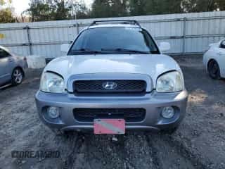2001 Hyundai Santa Fe GLS z VIN KM8SC83D91U084712, wystawiony jako Copart lot #87107674 z przebiegiem 111 465 mil mil oraz Czysty tytuł • Clean title. Historia ofert i sprzedaży dostępna na DreamBid. Obrazek 5.