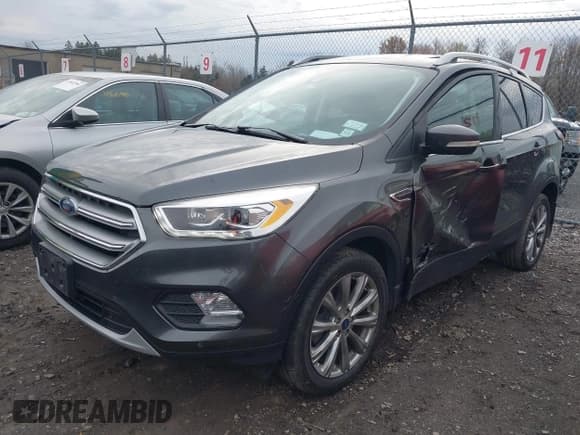 ✅ 2017 Ford Escape Titanium • VIN: 1FMCU9J95HUE81320 • Lot: 43612877. Listed on IAAI with 78,653 mi. Free auction sales archive from the USA and detailed vehicle history report at DreamBid. Image 17.