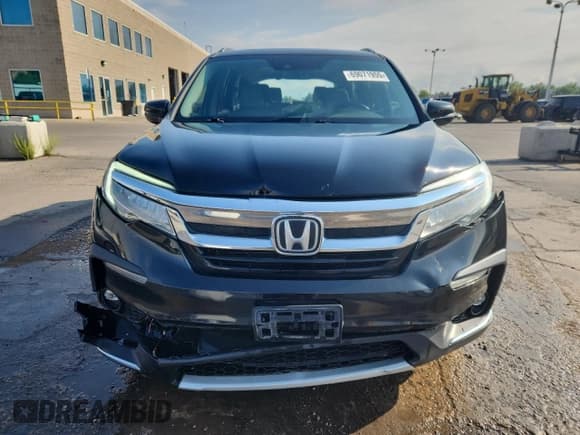 ✅ 2019 Honda Pilot Touring 7-Passenger • VIN: 5FNYF6H69KB092985 • Lot: 69071955. Listed on Copart with 128,915 mi. Free auction sales archive from the USA and detailed vehicle history report at DreamBid. Image 5.
