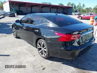 ✅ 2016 Nissan Maxima Platinum • VIN: 1N4AA6AP1GC385650 • Лот: 43573949. Опубликован ранее на IAAI с пробегом 124 669 миль. Бесплатный доступ к архиву аукционных продаж из США и подробный отчёт об истории автомобиля на DreamBid. Изображение 3.